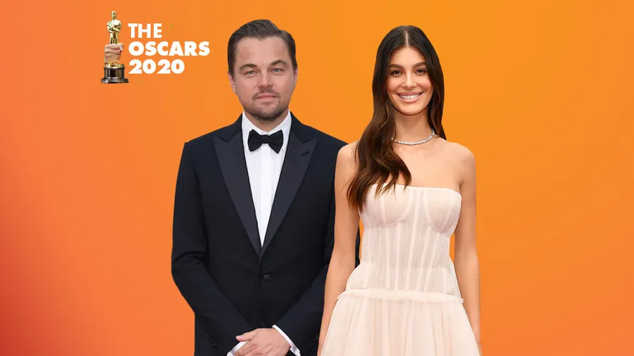 Leonardo-Di-Caprio-Camila-Morrone-Sentados-Al-PAcino