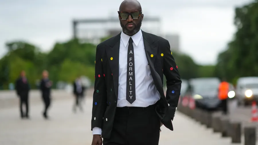 Street Style - Paris Fashion Week - Haute Couture Fall/Winter 2021/2022 : Day One