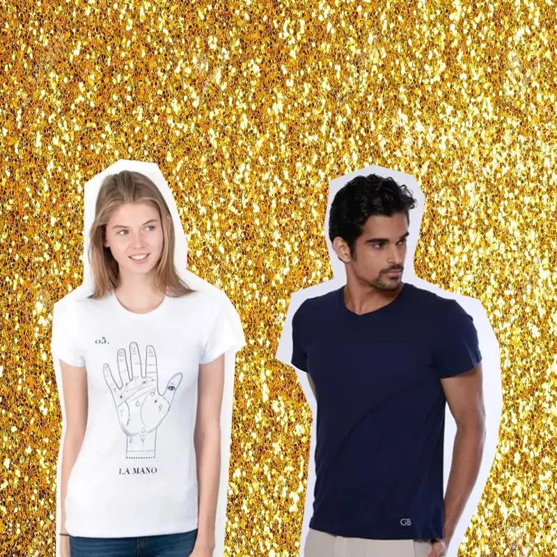 Sprinkle glitter gold dust on a black background with copy space