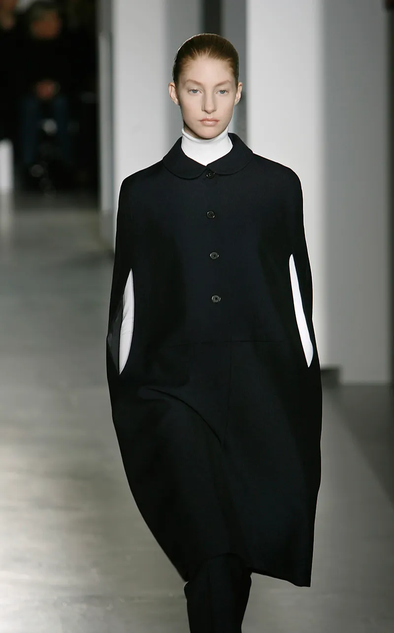 MILAN ? FEBRUARY 20: Models walk down the catwalk during the Jill Sander by Raf Simons' Autumn/Wint