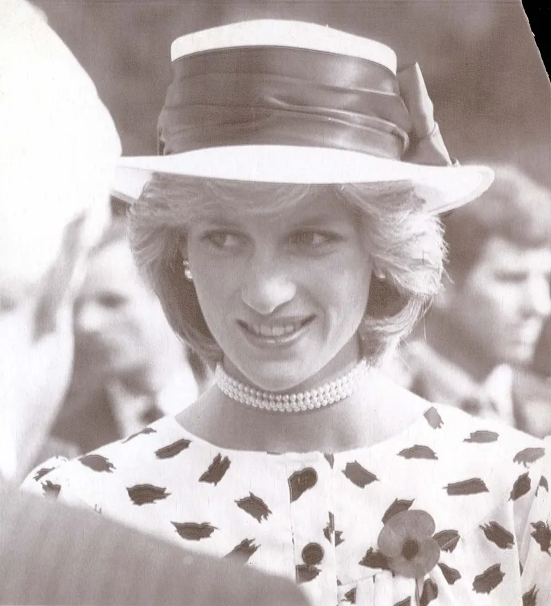 Prince &amp; Princess Of Wales Tour Of Australia &amp; New Zealand 23rd April 1983 Auckland New Zealand A Radiant Princess Diana Wearing A Blue And White Dress With White Hat And Black Band At A Garden Party In Auckland Today. ...royalty
