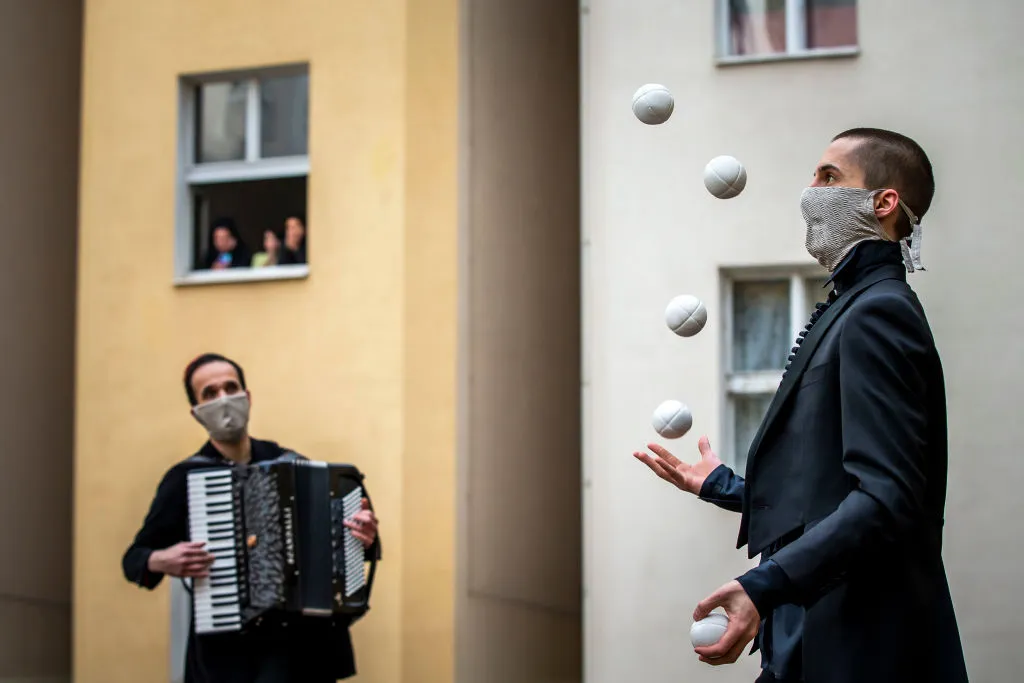 Acrobats Entertain Prague Residents Quarantined Due To Coronavirus