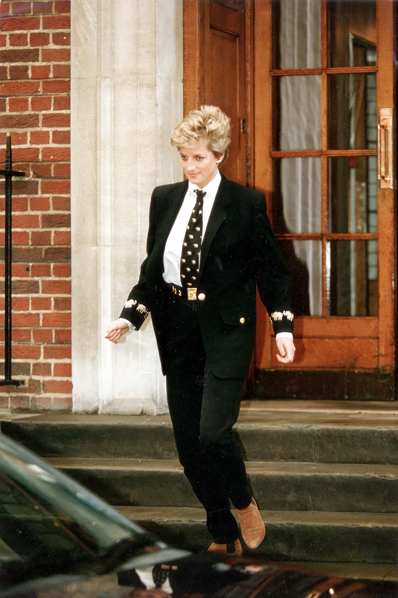 Diana Princess Of Wales - March 1994 Di Leaves St. Marys Hospital. Princess Diana Stepped Out Yesterday...but Whether She Was In Style Was A Matter Of Fierce Controversy. She Wore A Black Jacket And Tie Embroided With Gold Elephants And Black Jeans H