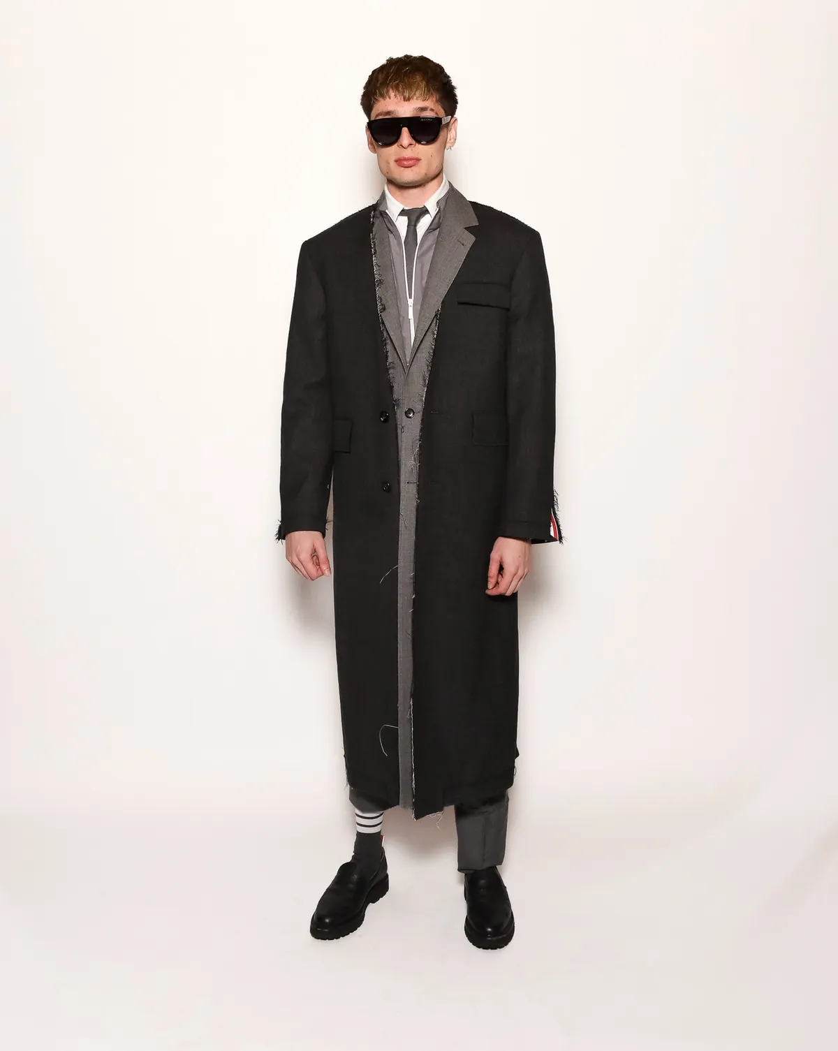 Peso Pluma en Thom Browne.