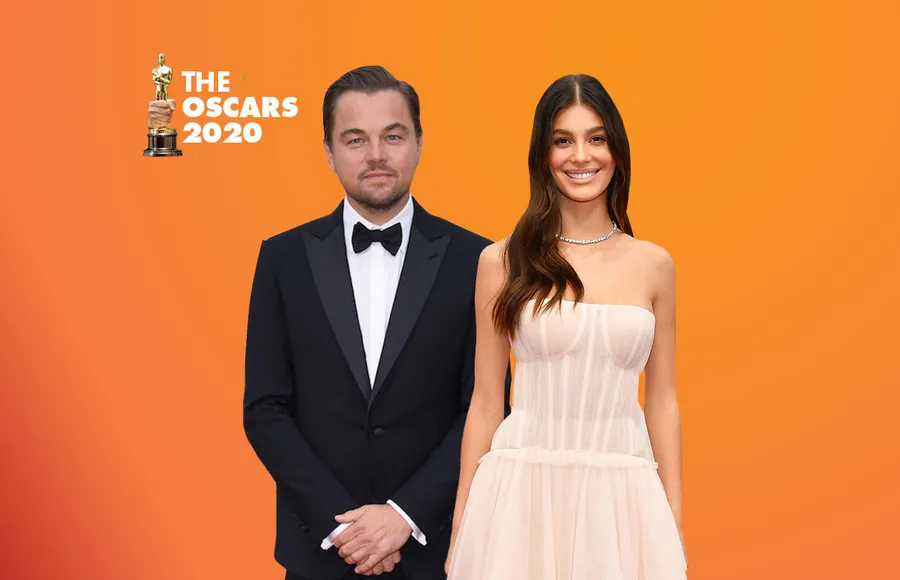 Leonardo-Di-Caprio-Camila-Morrone-Sentados-Al-PAcino