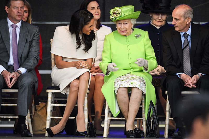 The Duchess Of Sussex Undertakes Her First Official Engagement With  Queen Elizabeth II