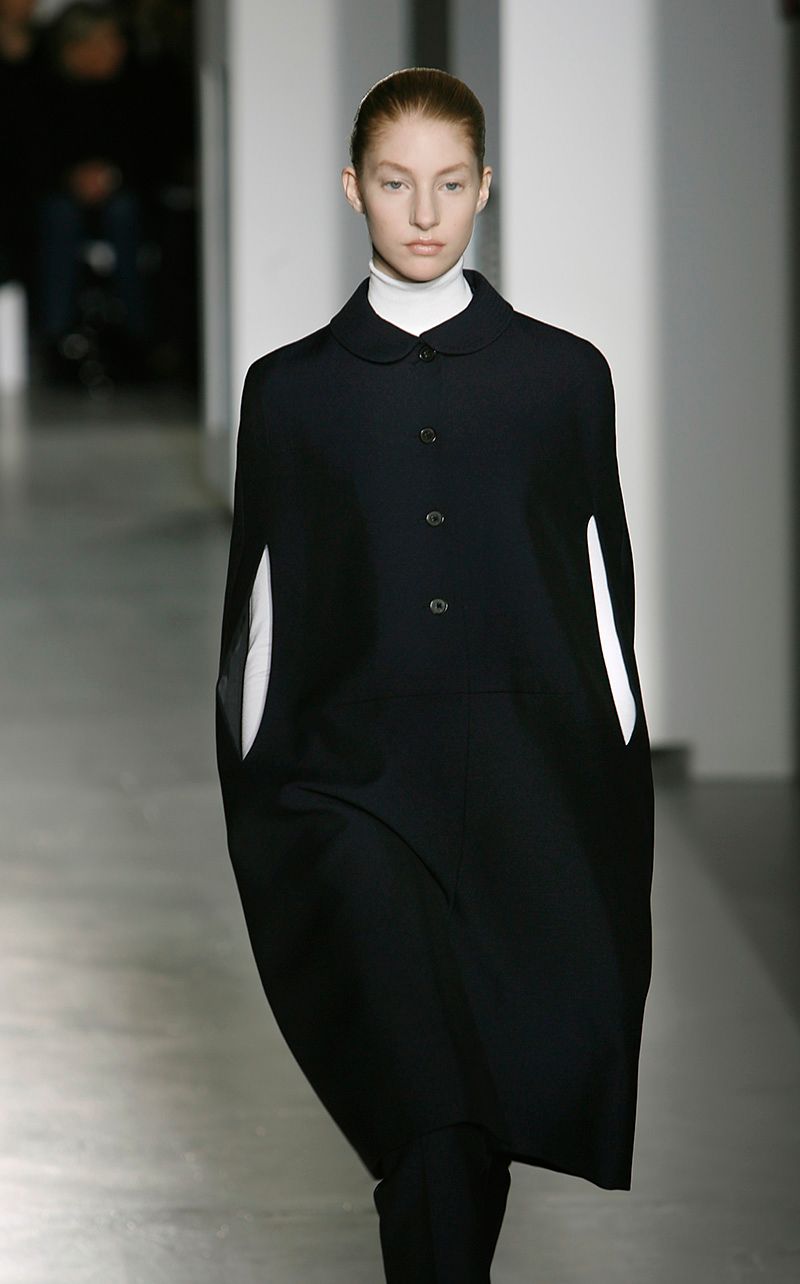 MILAN ? FEBRUARY 20: Models walk down the catwalk during the Jill Sander by Raf Simons' Autumn/Wint