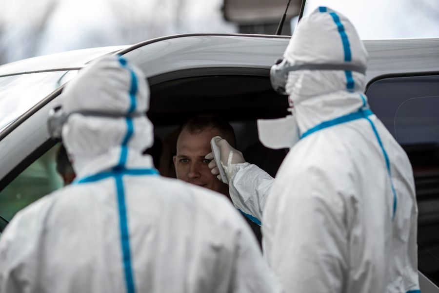 Border Guards Check Incoming Travellers For Coronavirus Infection