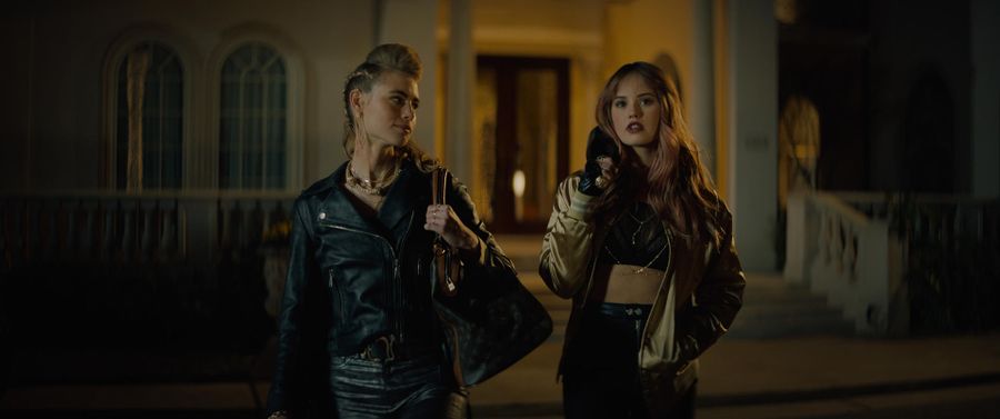 NIGHT TEETH (2021). Lucy Fry as Zoe and Debby Ryan as Blaire.
