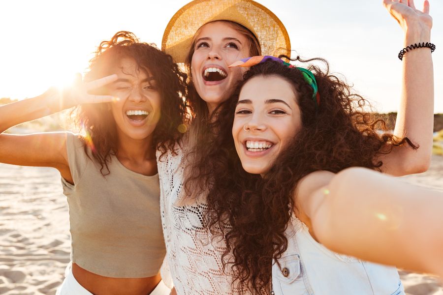 Three,Cheerful,Girls,Friends,In,Summer,Clothes,Taking,A,Selfie
