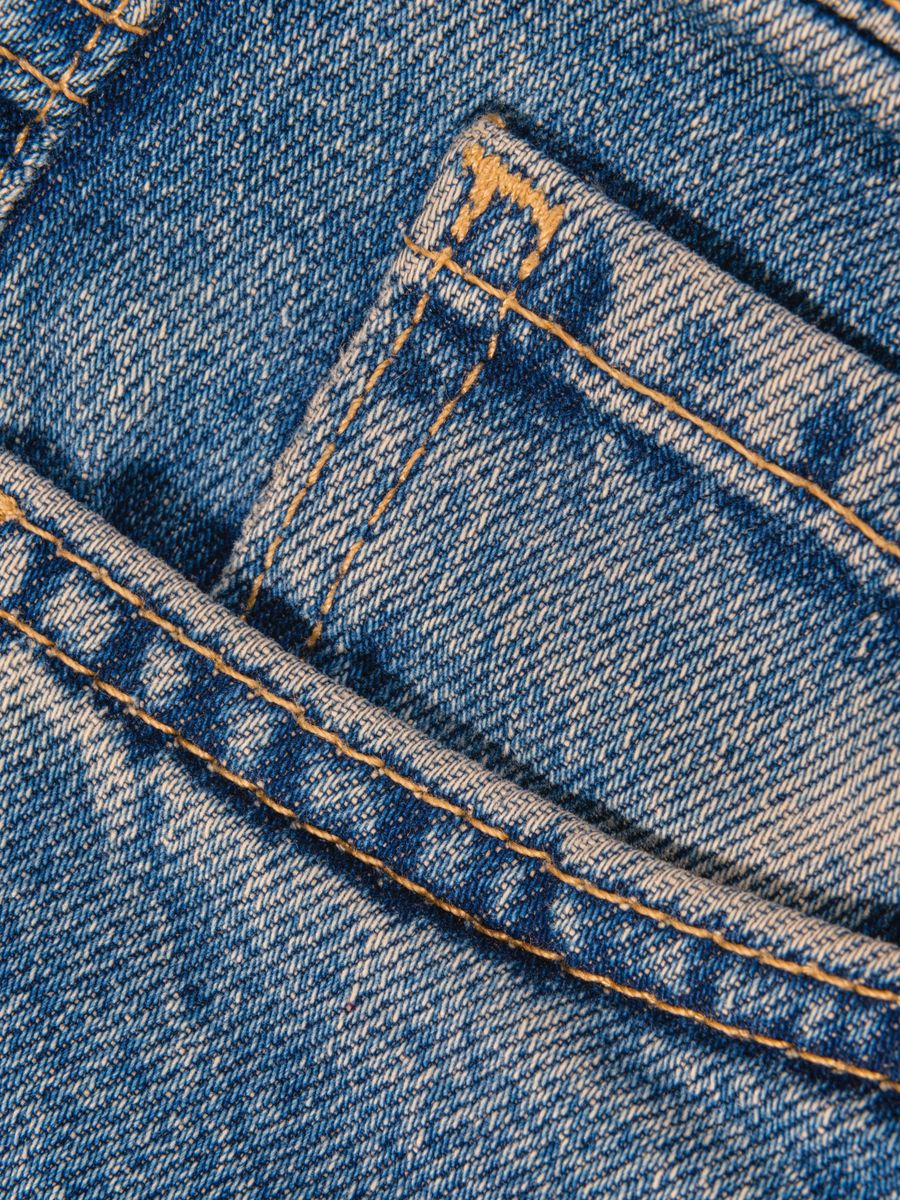 ¿Para qué sirve el mini bolsillo de los jeans?