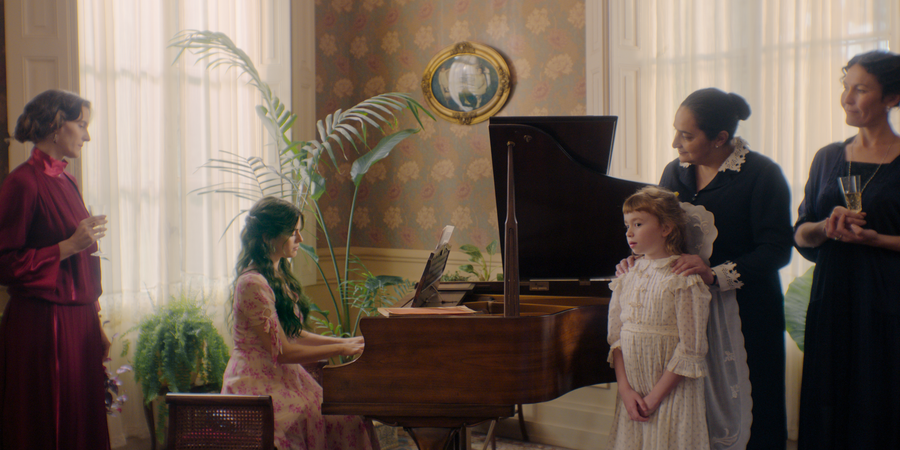Chiara Parravicini (Rosa) playing the piano and Francesca Turco (Kid Clara).png
